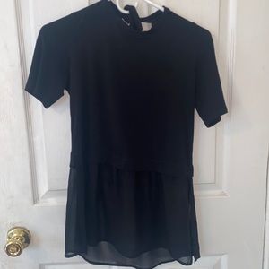 Black simple top with a sheer bottom